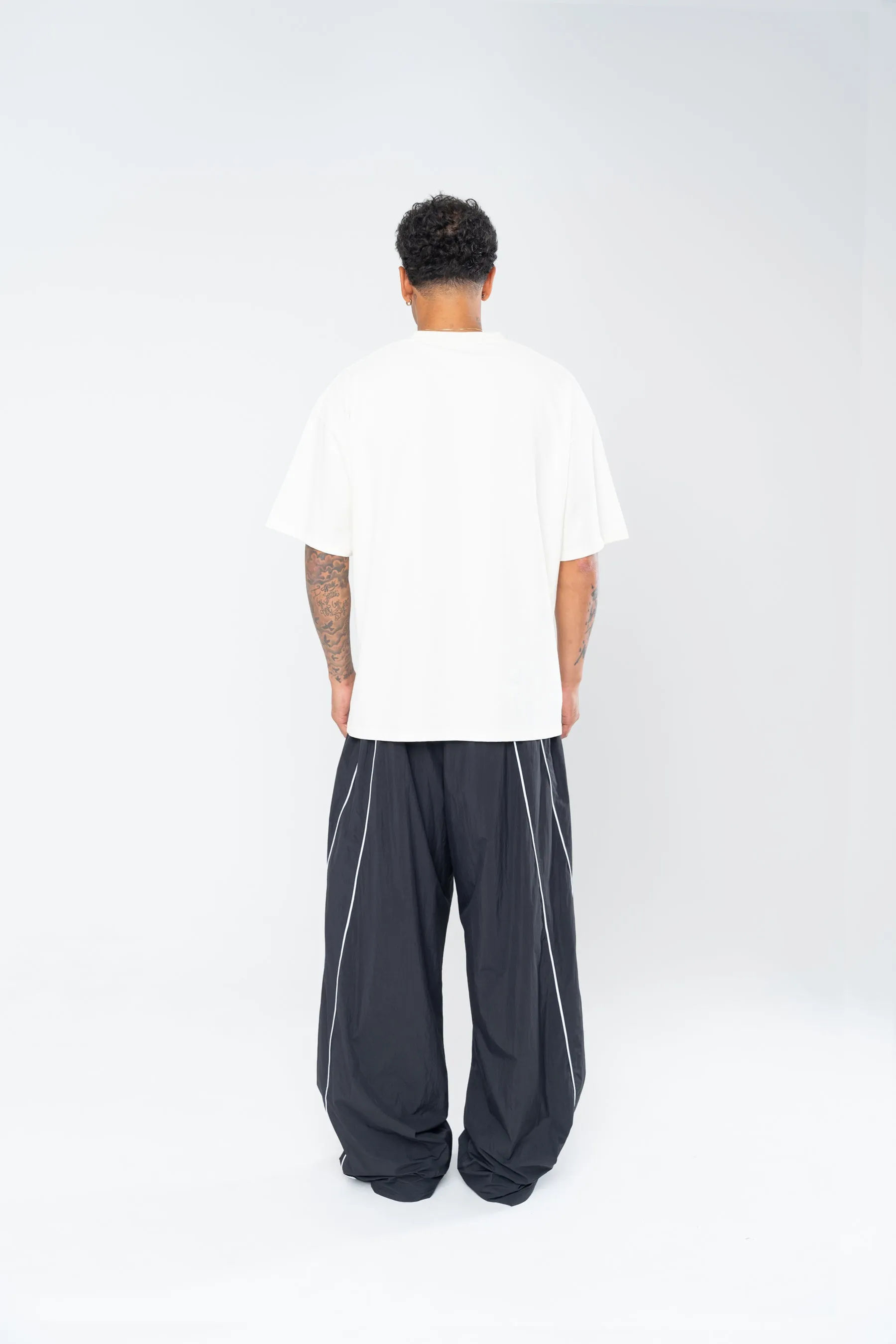 SPORTSWEAR BAGGY TRACK PANTS - BLACK